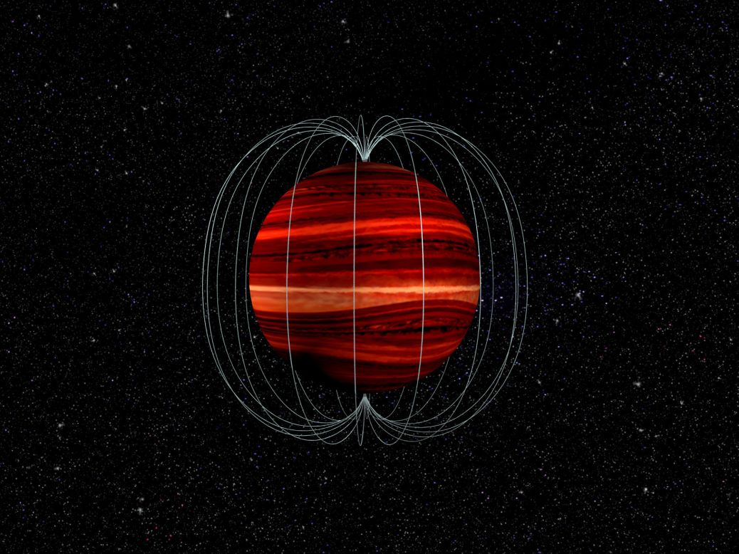 This is an artist's illustration of a brown dwarf, or a "failed star" object, and its magnetic field. The brown dwarf's atmosphere and magnetic field rotate at different speeds, which allowed astronomers to determine wind speed on the object. 