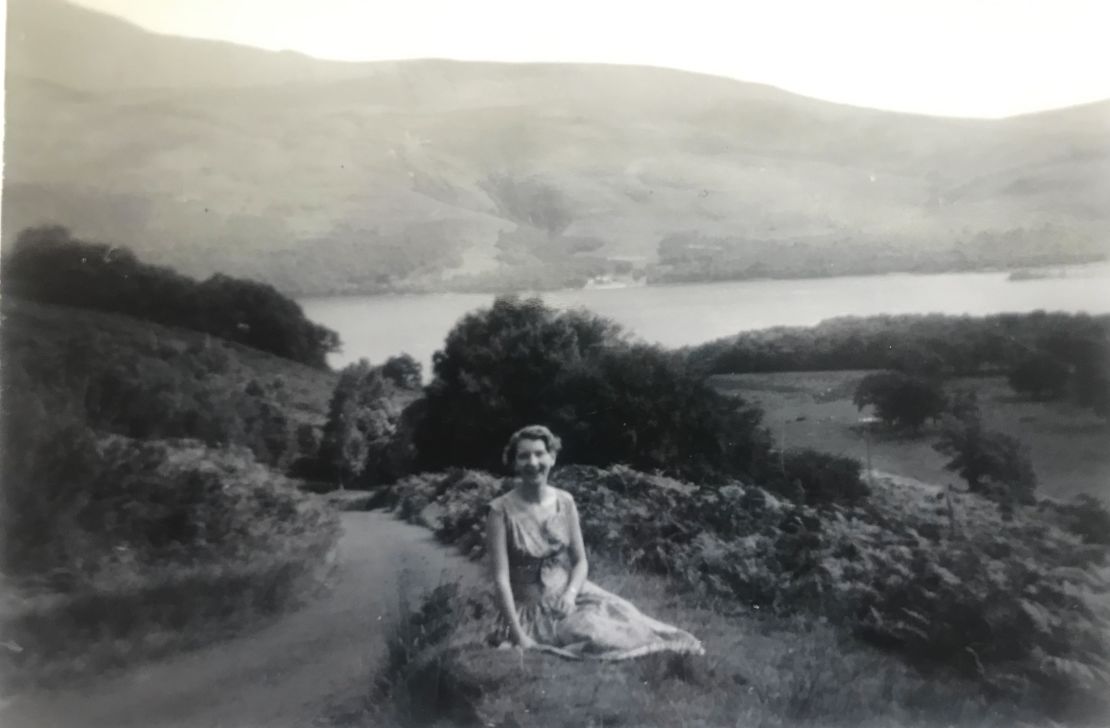 Mavis Johnston lounging on the banks of Loch Lomond, Scotland in 1958