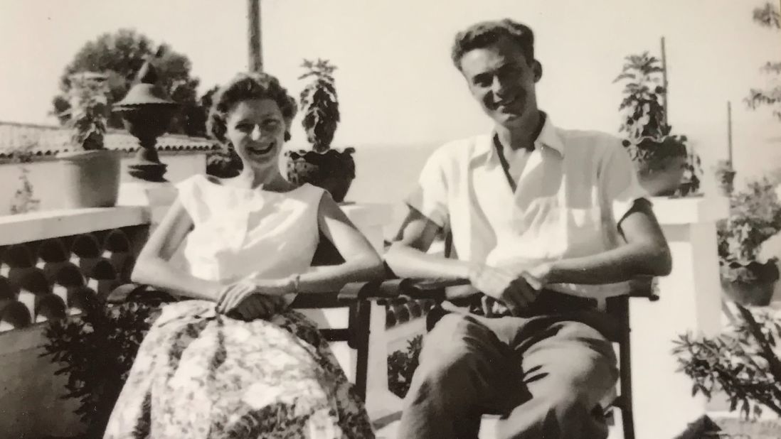 <strong>Summer days:</strong> Here, Mavis is pictured with her husband, Peter Johnston, on the hotel veranda in Mallorca. Spain in 1956 was just on the brink of becoming a popular holiday destination for Brits abroad. 