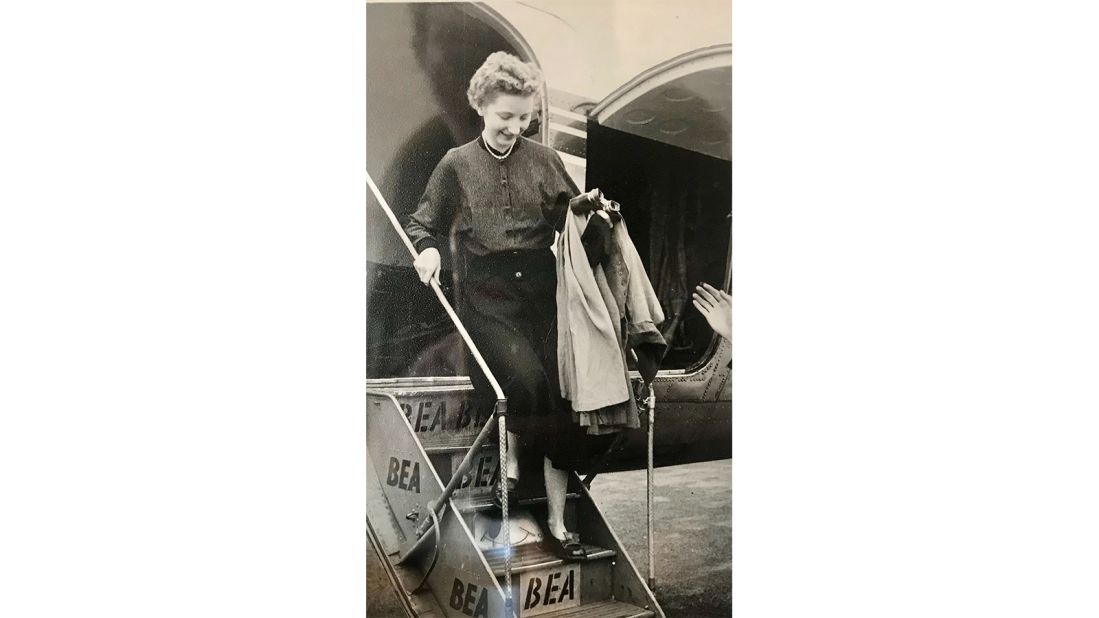 <strong>Golden age of travel:</strong> Here Johnston is pictured disembarking an airplane in the 1950s in the Isle of Man. In Britain's postwar years, air travel was a rarity for ordinary holidaymakers.