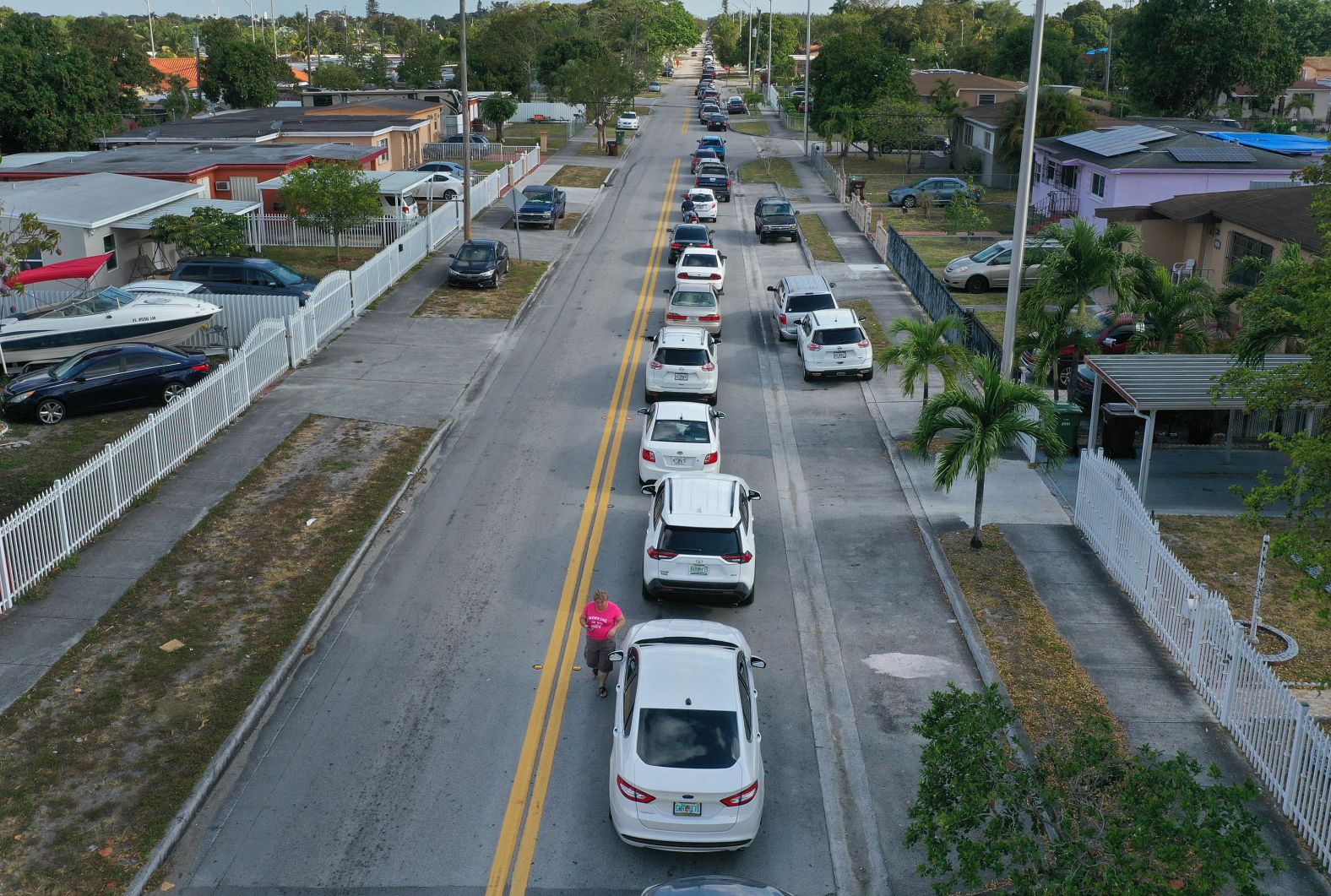 Cars line up to receive unemployment applications that were being given out in Hialeah, Florida, in April.