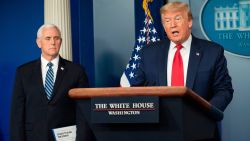 US Vice President Mike Pence listens as US President Donald Trump speaks during the daily briefing on the novel coronavirus, which causes COVID-19, in the Brady Briefing Room at the White House on April 9, 2020, in Washington, DC.