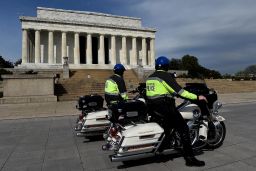 US Capitol police officers patrol near the Lincoln Memorial and National Mall due to concerns with the spread of the coronavirus.