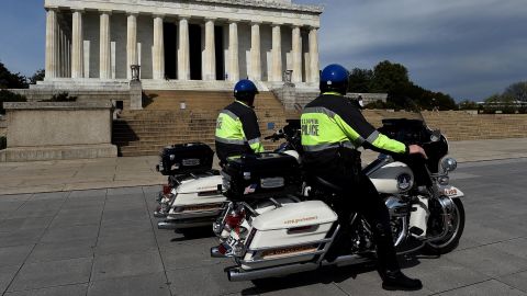 US Capitol police officers patrol near the Lincoln Memorial and National Mall due to concerns with the spread of the coronavirus.