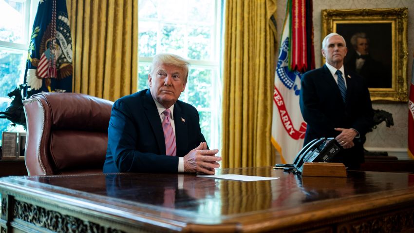 WASHINGTON, DC - APRIL 10: President Donald Trump and Vice President Mike Pence listen during a Easter blessing in the Oval Office of the White House on  April 10, 2020 in Washington, DC.The Trump adminstration is stressing the need for physical distancing over the Easter weekend. (Photo by Al Drago/Pool/Getty Images)