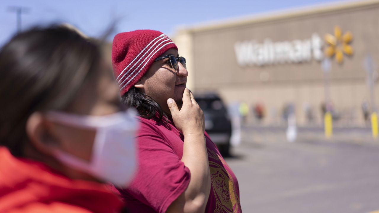 Navajo Nation tribal member Chris Long, 32, and his girlfriend Shannon Monroe, 30, shop on April 11, 2020, at Walmart in Winslow, Arizona. 