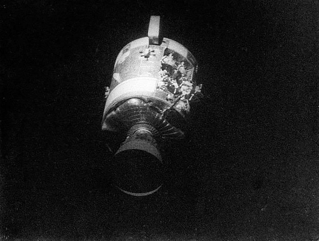 Lovell took a photo of the severe damage to the service module after they jettisoned it. 