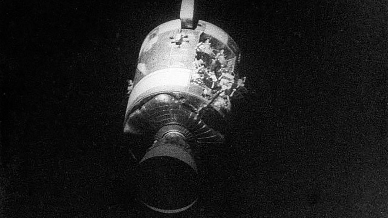 Lovell took a photo of the severe damage to the service module after they jettisoned it. 