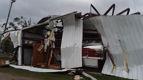 Candice Pitts hunkered down at the Soso Volunteer Fire Station in Jones County, Missisippi, where parts of the roof blew away or collapsed in the storm.
