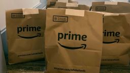 A delivery of groceries from Whole Foods is dropped at a customer's apartment door by Amazon Prime during the coronavirus pandemic, Thursday, April 2, 2020, in New York.