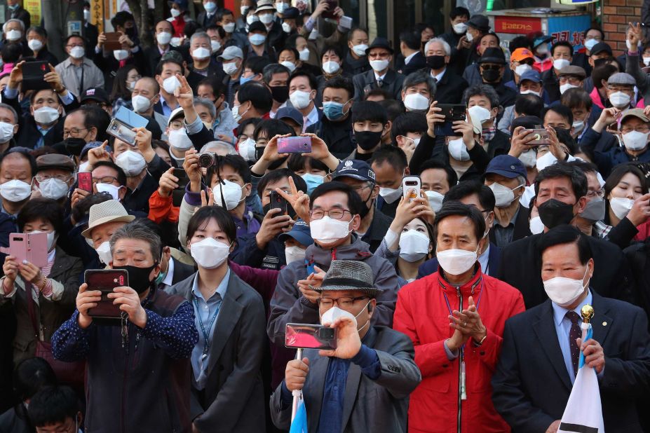 People in Seoul, South Korea, listen to a speech from Hwang Kyo-ahn, who was campaigning for the upcoming <a href="https://edition.cnn.com/2020/04/13/asia/elections-coronavirus-pandemic-intl-hnk/index.html" target="_blank">parliamentary elections.</a>