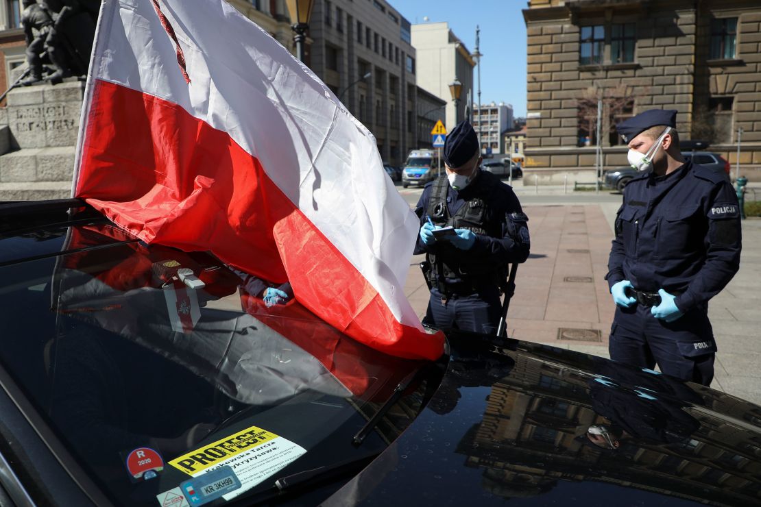 Business owners attend a car protest demanding economic support for entrepreneurs in Krakow, Poland, on April 7.