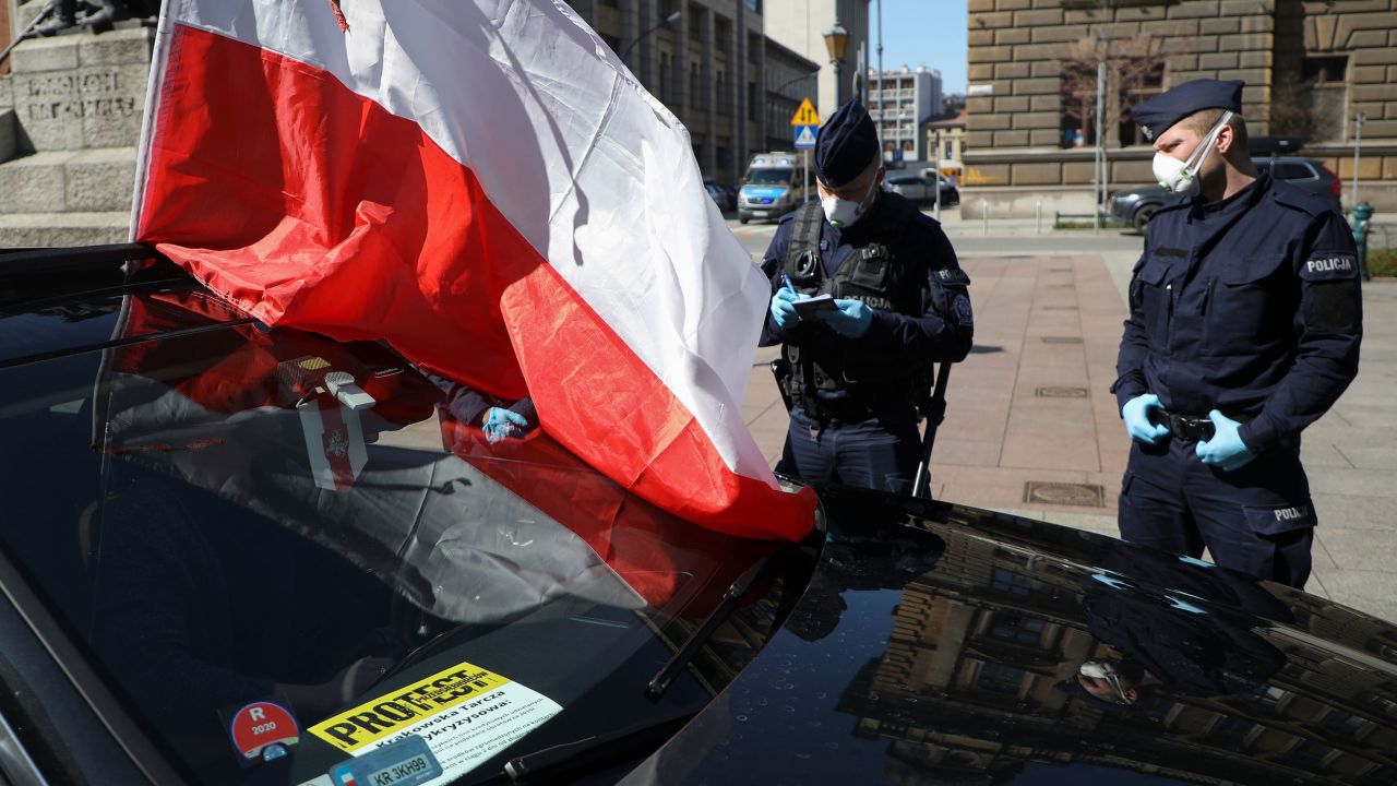 Business owners attend a car protest demanding economic support for entrepreneurs in Krakow, Poland, on April 7.