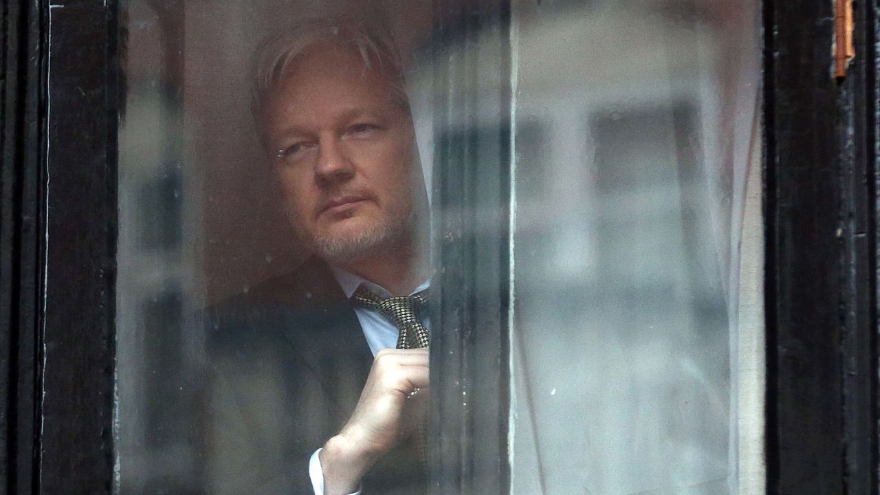 WikiLeaks founder Julian Assange prepares to speak from the balcony of the Ecuadorian embassy on February 5, 2016 in London, England.