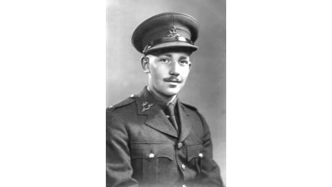 Tom Moore, pictured here as a young man, is raising funds for the NHS by walking laps of his garden.