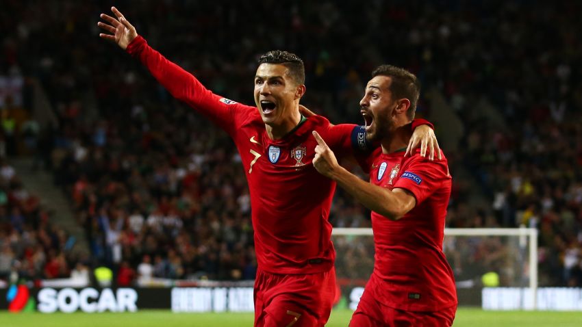 PORTO, PORTUGAL - JUNE 05: Cristiano Ronaldo of Portugal celebrates after scoring his team's second goal with Bernardo Silva during the UEFA Nations League Semi-Final match between Portugal and Switzerland at Estadio do Dragao on June 05, 2019 in Porto, Portugal. (Photo by Jan Kruger/Getty Images)