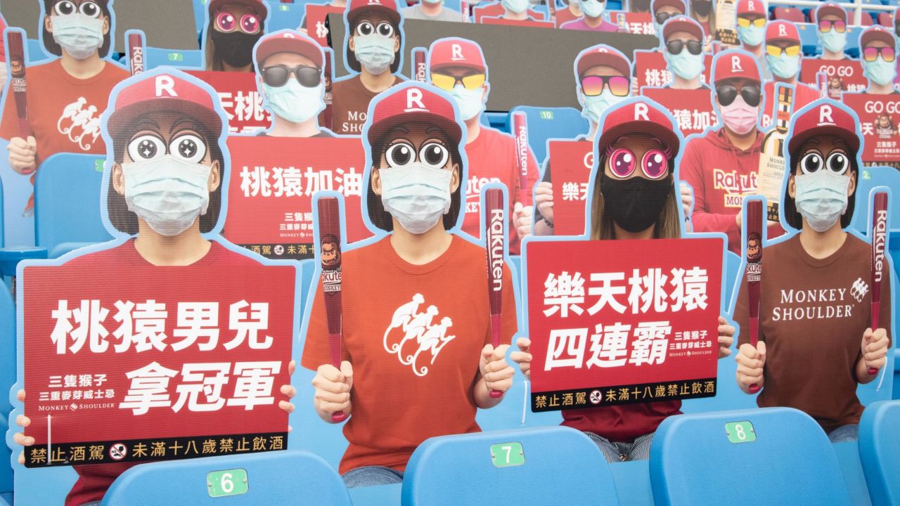 Cardboard cutouts of fans filled parts of the stadium for Saturday's washed-out baseball game. 