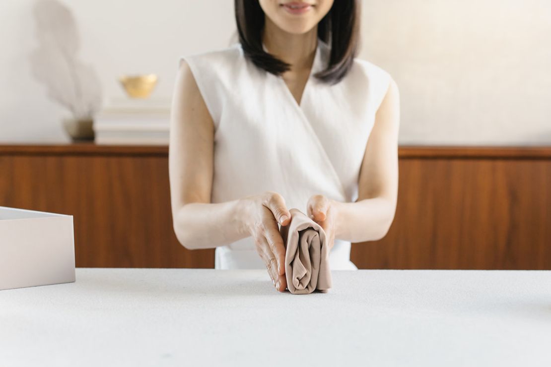 Kondo recommends folding garments carefully and then placing them upright in a drawer to maximize space.