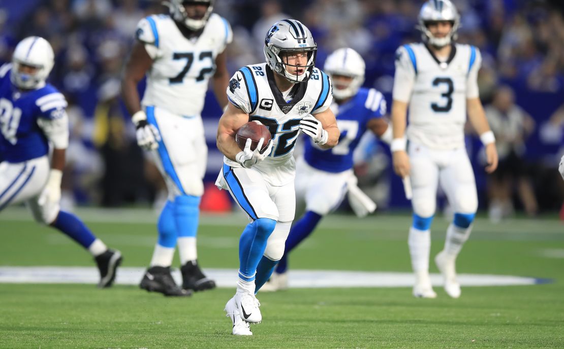McCaffrey runs with the ball against the Indianapolis Colts.