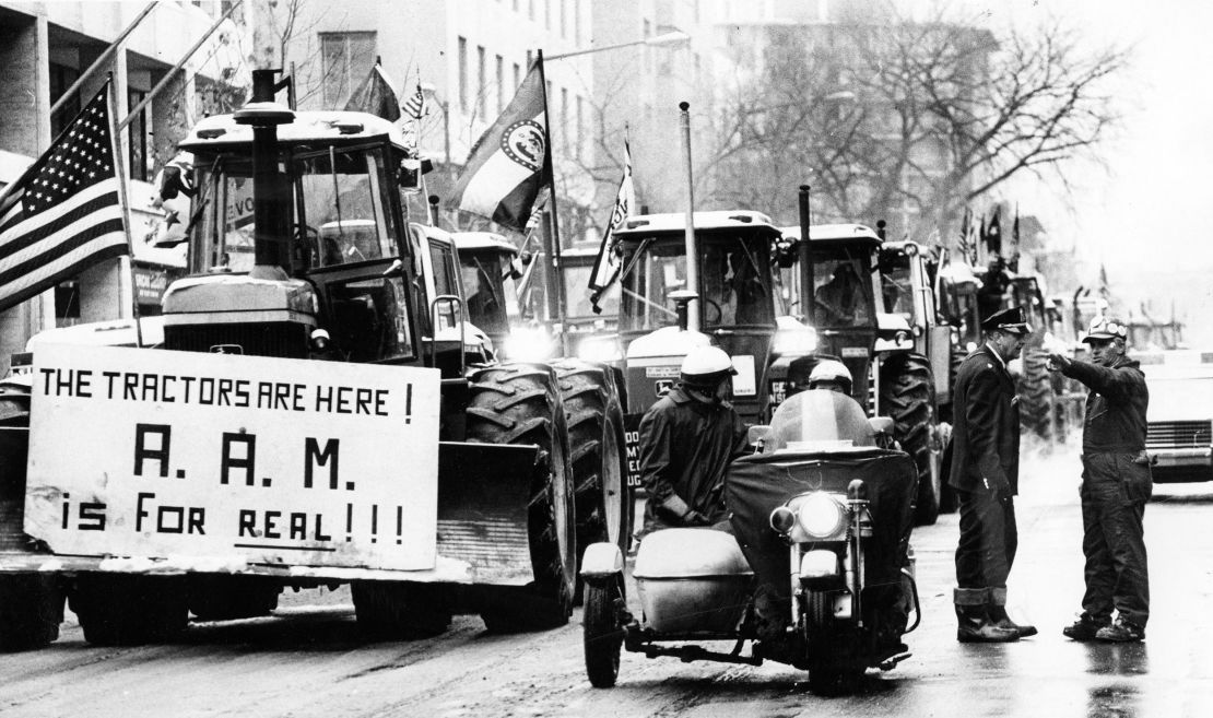 Tractors line up on 15th Street in Washington as  police attempt to keep order on February 16, 1979.