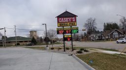 The gas prices below $1 at Casey's General Store in Wautoma, Wisconsin. Nearly 10% of stations in Wisconsin are now selling gas for less than $1 a gallon. And there are more than 400 stations spread across 15 states where drivers can buy gas for less than a dollar.