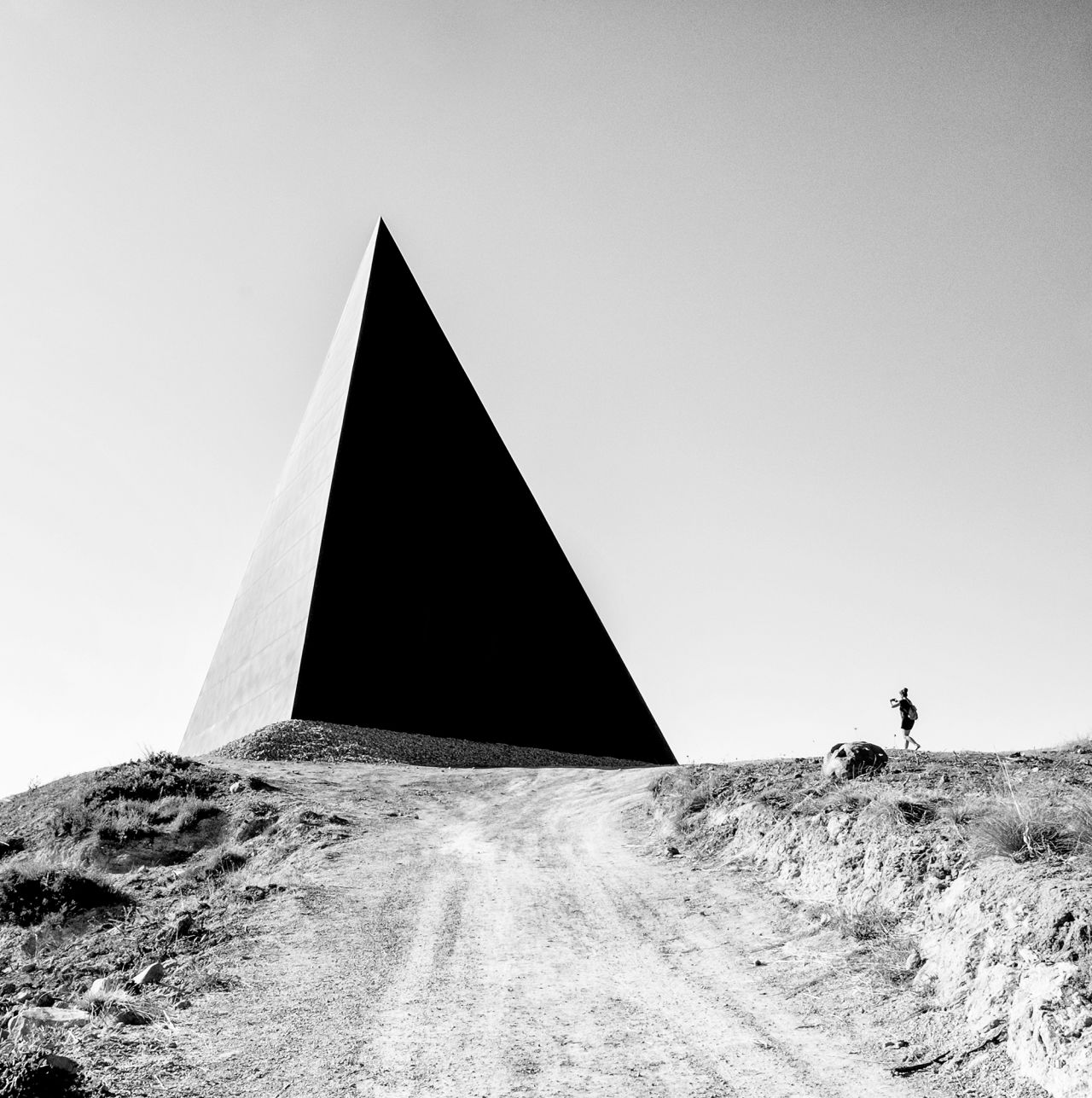 Rosaria Sabrina Pantano's image of a pyramid-shaped sculpture standing at the 38th parallel, a circle of latitude that passes through Sicily, Italy.