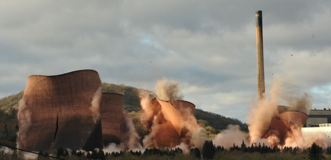 Photographer Alec Connah captured the precise moment that four cooling towers in Shropshire, England, were demolished.