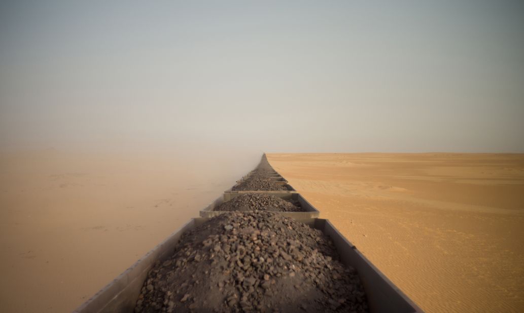Adrian Guerin's image of a 2.5-kilometer-long iron-ore train in Mauritania was selected as one of 10 winners in the Sony World Photography Awards Open competition. Scroll through the gallery to see the other category winners.