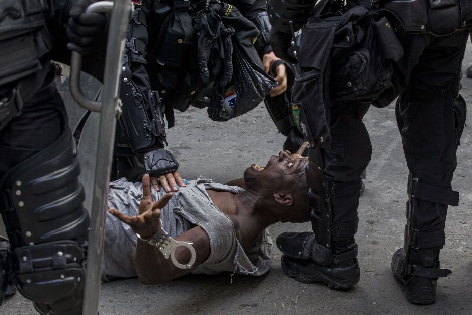 Santiago Mesa won the street photography category for this image of a protester being detained by riot police in the Colombian city of Medellin.