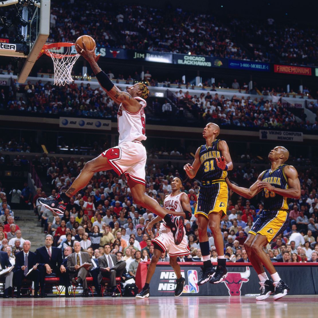 Dennis Rodman (left) in the 1998 NBA playoffs. (Photo by Nathaniel S. Butler/NBAE via Getty Images)