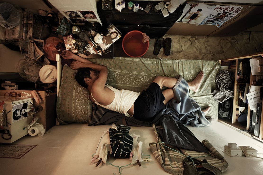 A handout image from the Society for Community Organization, also taken by photographer Benny Lam, shows the inside of one of Hong Kong's "cage homes." 