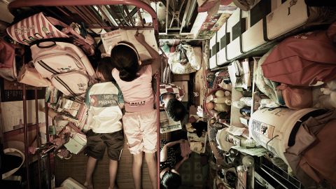 This photograph taken by Benny Lam for the Society for Community Organization shows the inside of one of Hong Kong's "cage homes." 