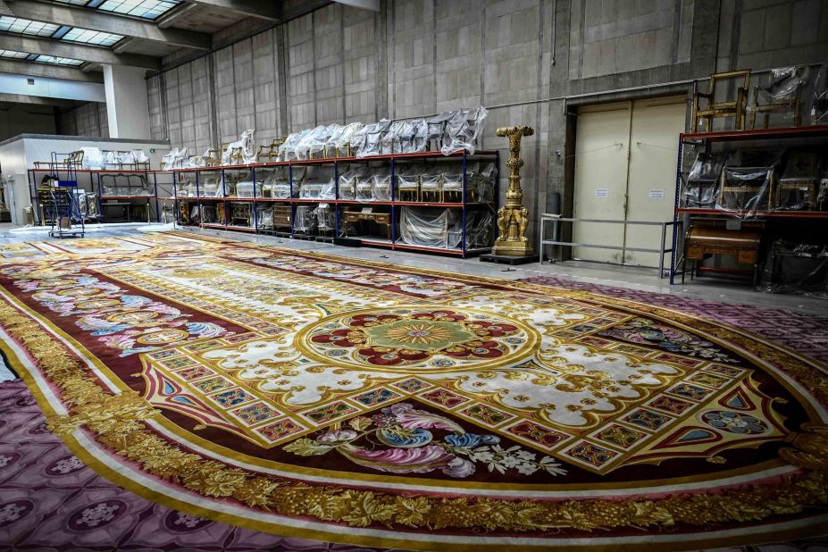 A carpet from Notre Dame cathedral undergoes restoration at 'the Mobilier National' headquarters in Paris on September 12, 2019.