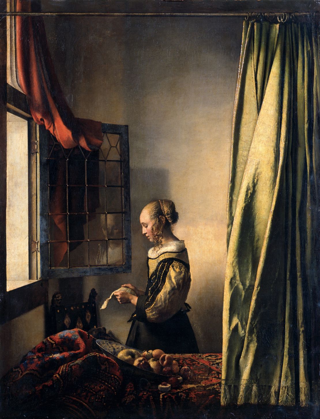 Vermeer's "A Girl Reading a Letter at an open window" (1657)