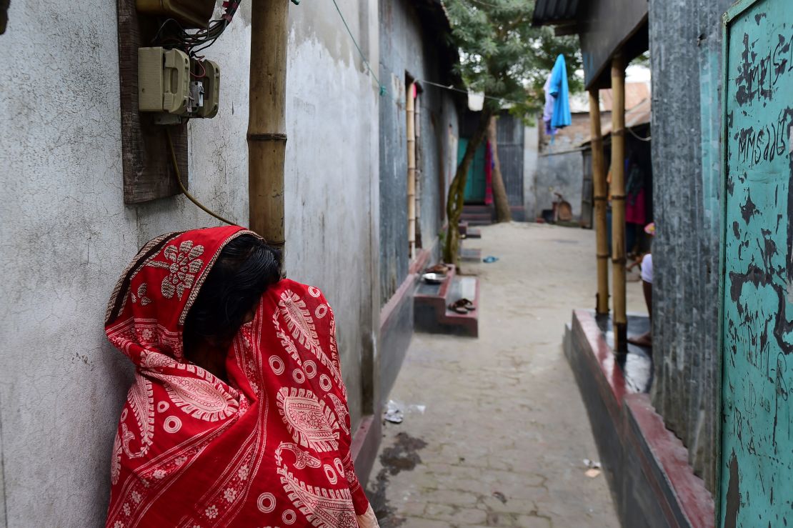 A sex worker in front of a brothel in Daulatdia, Bangladesh, on February 8.