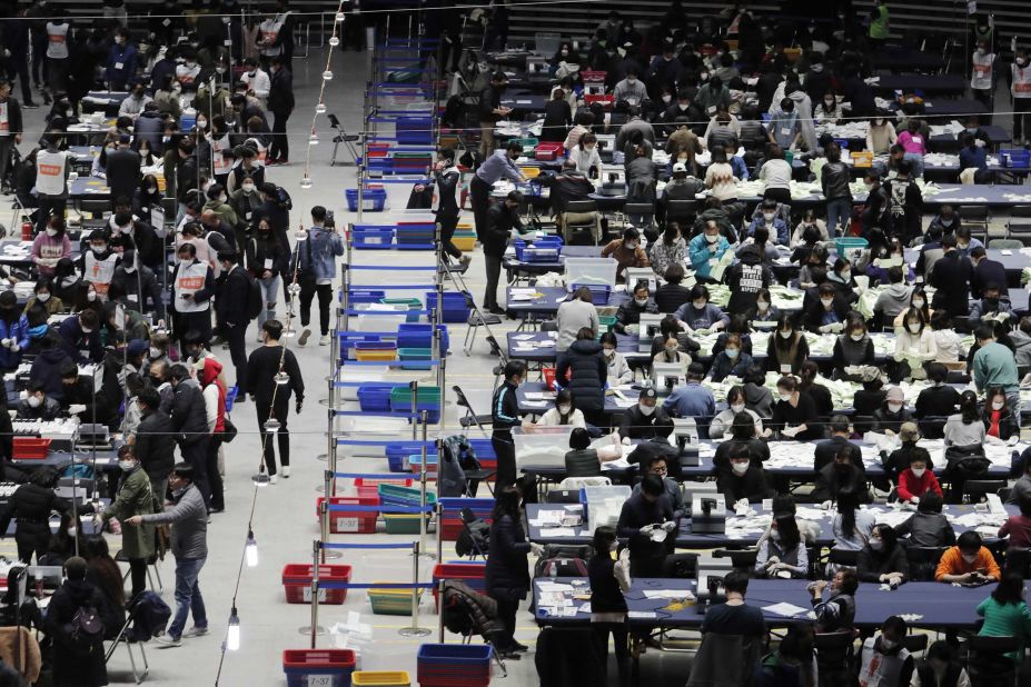 South Korean election officials sort out <a href="index.php?page=&url=https%3A%2F%2Fedition.cnn.com%2F2020%2F04%2F15%2Fasia%2Fsouth-korea-election-intl-hnk%2Findex.html" target="_blank">parliamentary ballots </a>at a gymnasium in Seoul on April 15, 2020.