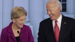 ATLANTA, GEORGIA - NOVEMBER 20: Sen. Elizabeth Warren (D-MA)  (L) and former Vice President Joe Biden smile at each other during the Democratic Presidential Debate at Tyler Perry Studios November 20, 2019 in Atlanta, Georgia. Ten Democratic presidential hopefuls were chosen from the larger field of candidates to participate in the debate hosted by MSNBC and The Washington Post.  (Photo by Alex Wong/Getty Images)