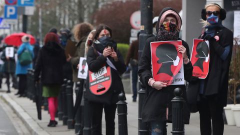 Women's rights activists, wearing masks against the spread of the coronavirus in Warsaw, Poland, on April 15, 2020.