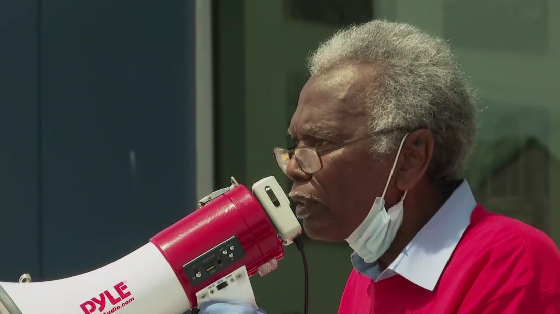 Robert Taylor speaks at a protest on Saturday.