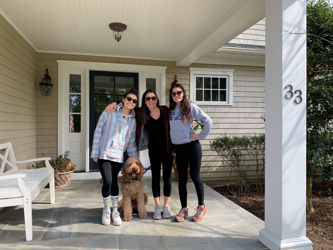 Sandra Sandoli (center) and her daughters pose at their Fair Haven, New Jersey, home.