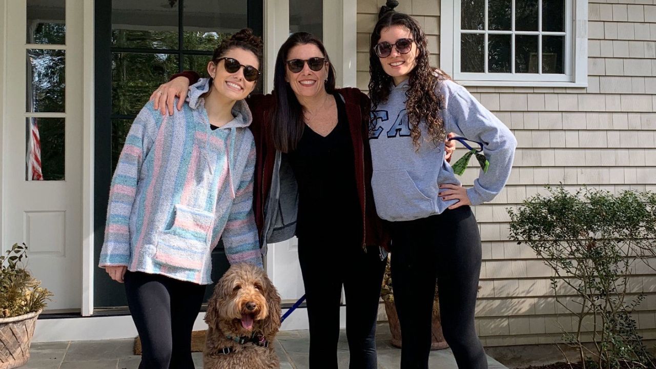 Sandra Sandoli (center) and her daughters pose at their Fair Haven, New Jersey, home.