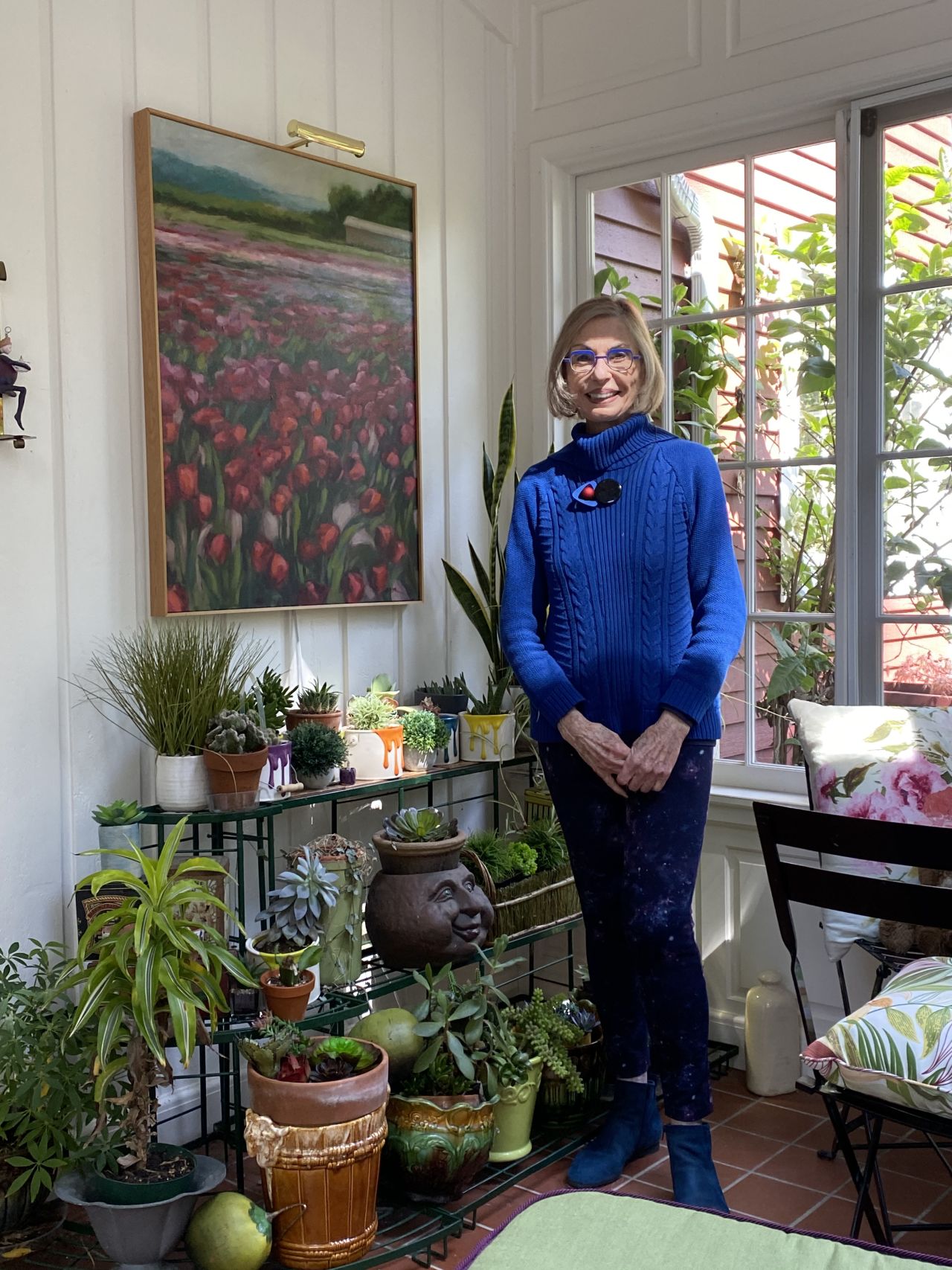 "My sun room is my sanctuary," Eiseman said. "The important colors in the room are green and violet, with a few other floral colors in the mix."