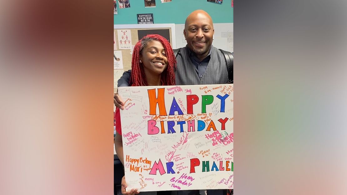 Kyiah Minor (left) attends a school run by Earl Martin Phalen, right.