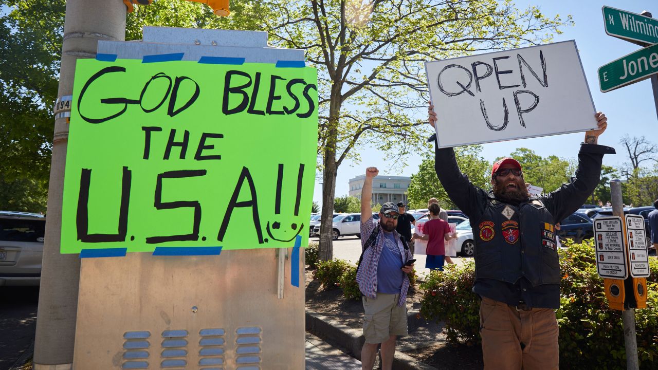 Protesters demonstrate against the North Carolina coronavirus lockdown at a parking lot adjacent to the state legislature in Raleigh on April 14.