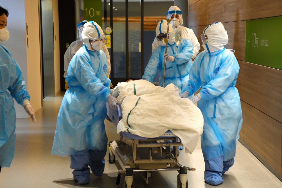 Medical staffs wearing protective gears hold an exercise for coronavirus outbreak at a hospital on February 7, 2020 in Tottori, Japan. 