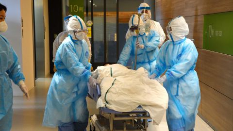 Medical staffs wearing protective gears hold an exercise for coronavirus outbreak at a hospital on February 7, 2020 in Tottori, Japan. 