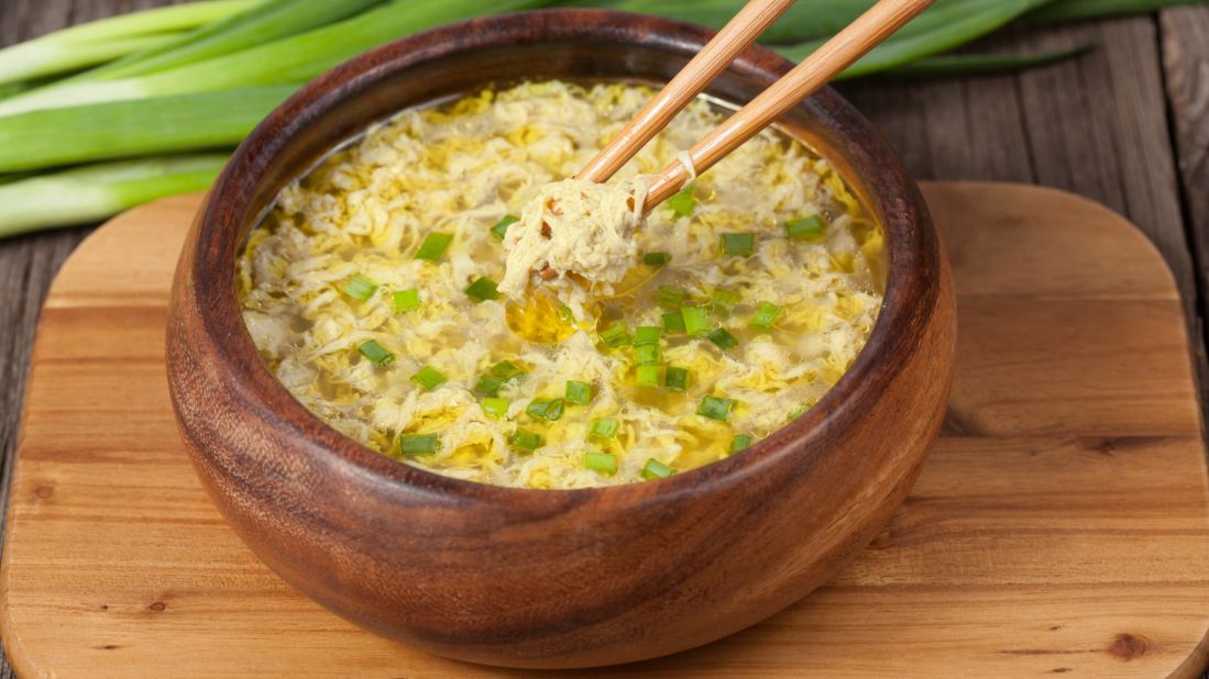 <strong>Egg drop soup</strong>: Simple and delicious, this Chinese restaurant go-to is made with chicken broth and thin ribbons of beaten eggs added at the last minute.