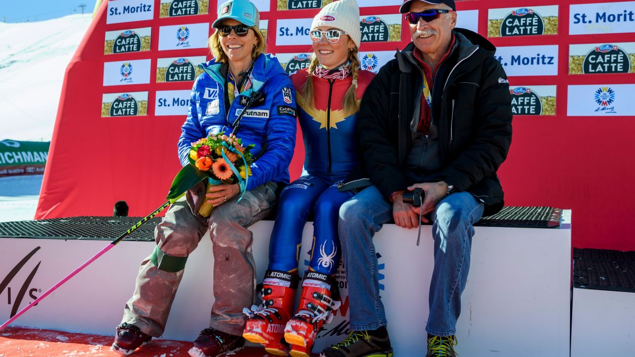 Shiffrin (C) poses with her parents Eileen and Jeff after winning the women's slalom race at the 2017 FIS Alpine World Ski Championships in St Moritz on February 18, 2017.