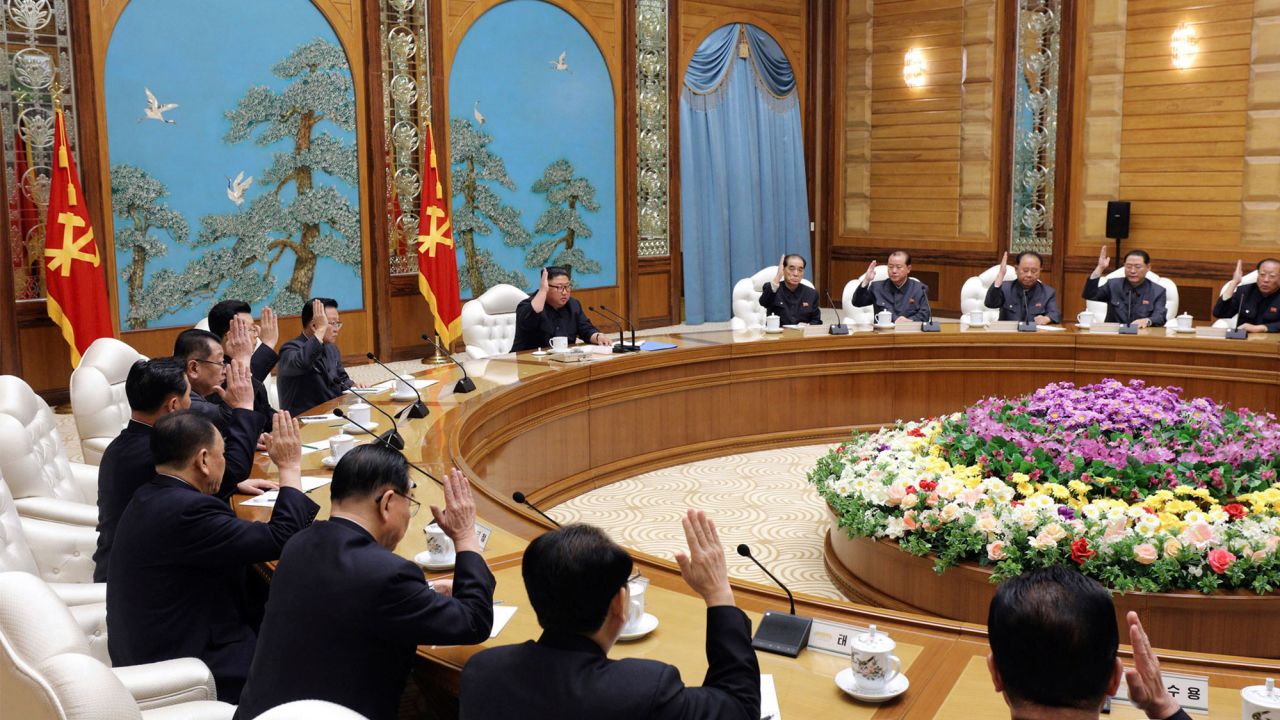 This photo provided by the North Korean government on Sunday purports to show North Korean leader Kim Jong Un, center top, attending a politburo meeting of the ruling Workers' Party of Korea in Pyongyang on Saturday.