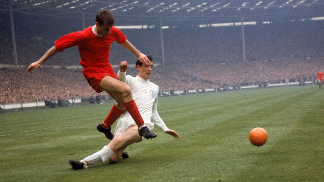Norman Hunter, pictured here in 1965 playing for Leeds against Liverpool in the FA Cup final, has died after contracting the coronavirus. 